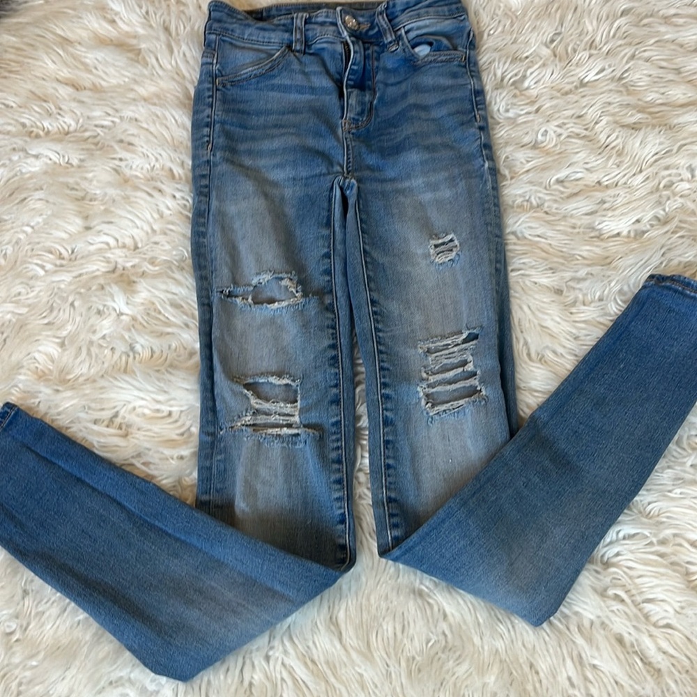 Light blue ripped jeans for women Size 0.